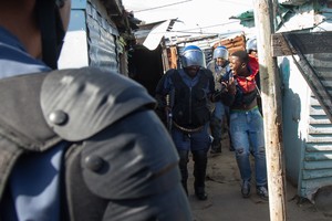 Photo of arrest during Langa protest