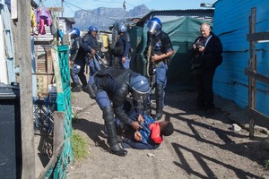 Photo of arrest during Langa protest