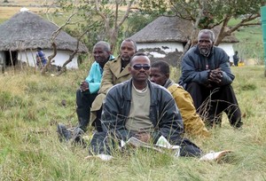 Photo of several people in a field