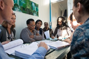 Photo of people sitting in a meeting