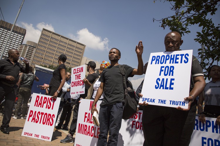 Photo of protesters against abusive churches