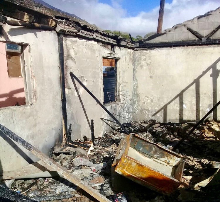 Photo of a burnt house