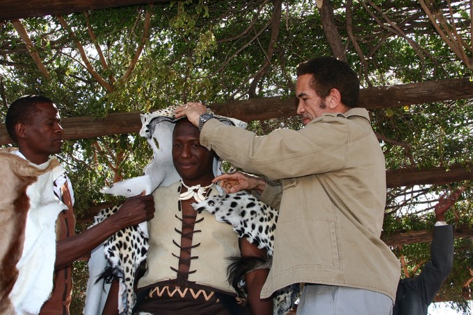 Photo of king being crowned.