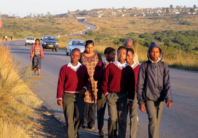 Photo of people walking on road