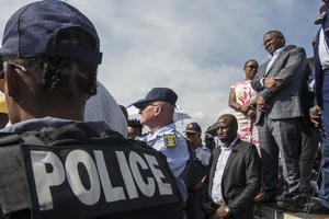 Photo of man and police officer