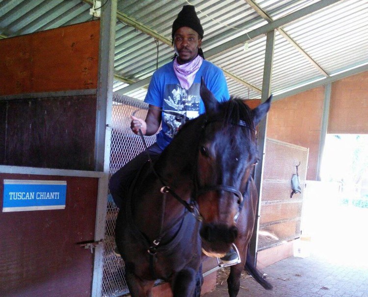 Photo of a man on a horse