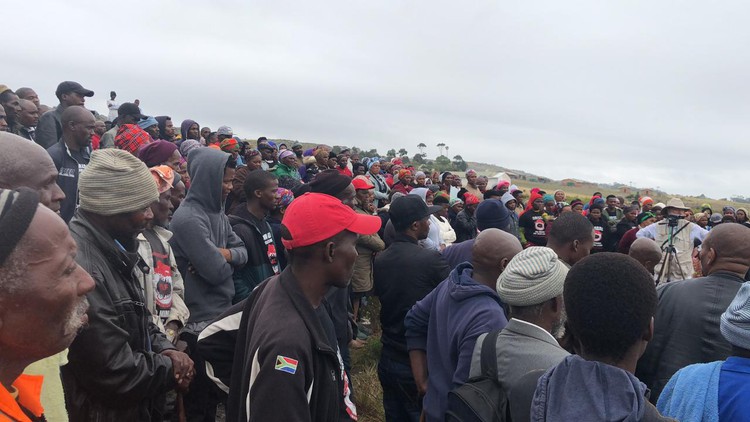 Photo of people on a hill