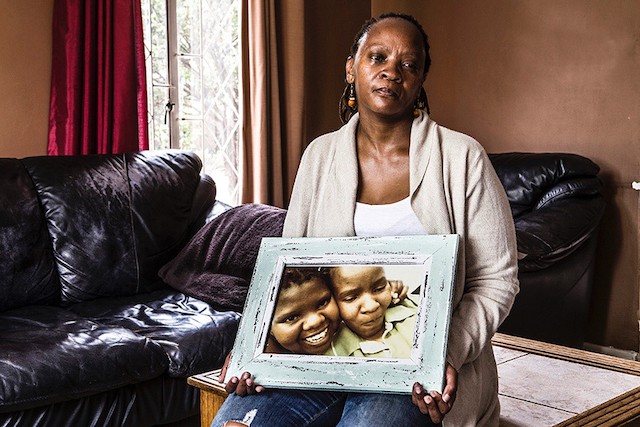 Photo of a woman holding a picture