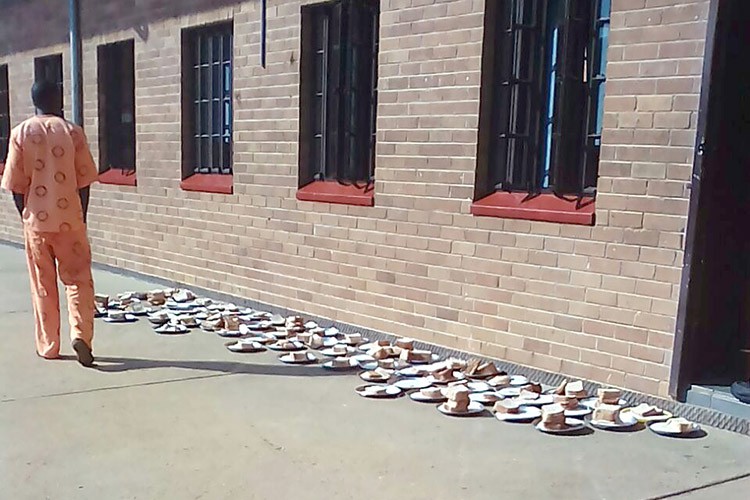 Photo of unattended meals at a prison