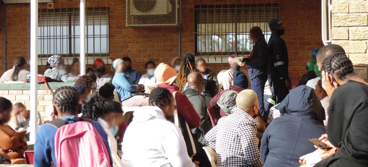 Photo of people waiting at clinic