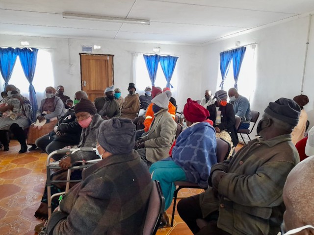 Photo of a waiting room full of people