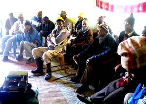 Photo of miners sitting