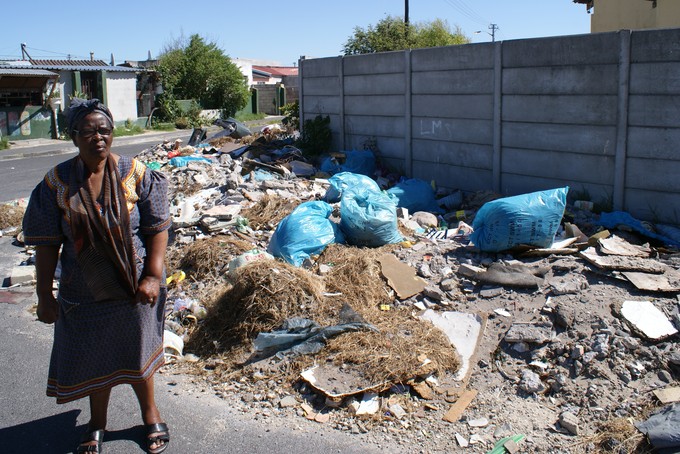 Photo of large amount of rubbish outside the church.