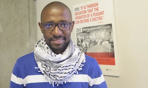 Photo of Tshepo Motsepe in his office