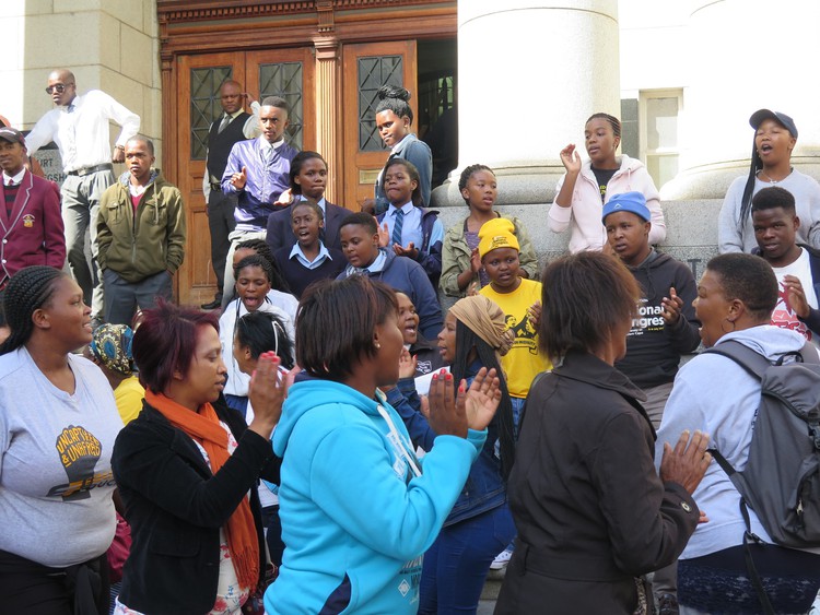 Photo of protesters outside court