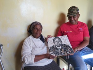 Photo of two women with a picture