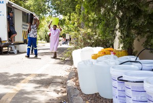 photo of women carrying water