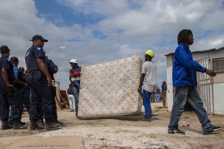 Photo of people being evicted