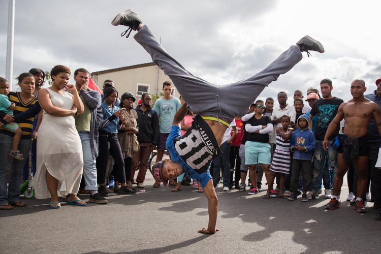 Photo of man breakdancing