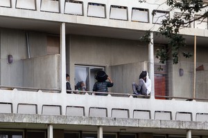 Residents occupy the old Helen Bowden Nurses Home near the V&A Waterfront in Cape Town.