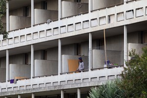 Residents occupy the old Helen Bowden Nurses Home near the V&A Waterfront in Cape Town.