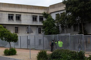 Residents occupy the old Helen Bowden Nurses Home near the V&A Waterfront in Cape Town.