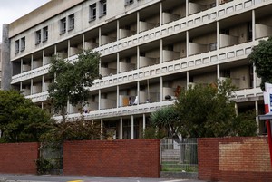 Residents occupy the old Helen Bowden Nurses Home near the V&A Waterfront in Cape Town.