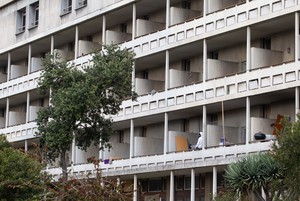 Residents occupy the old Helen Bowden Nurses Home near the V&A Waterfront in Cape Town.