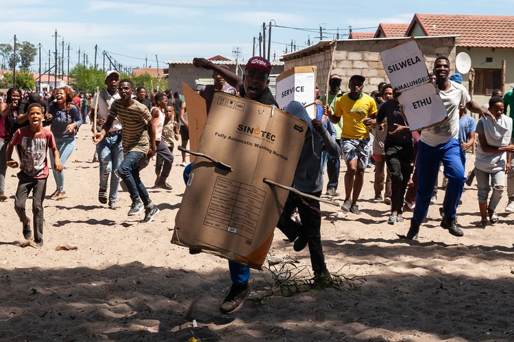 Hundreds protest for better services including a police station and clinics in Atlantis.