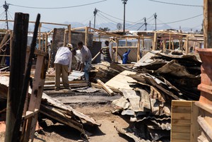 Residents Rebuild After Fire in Kosovo