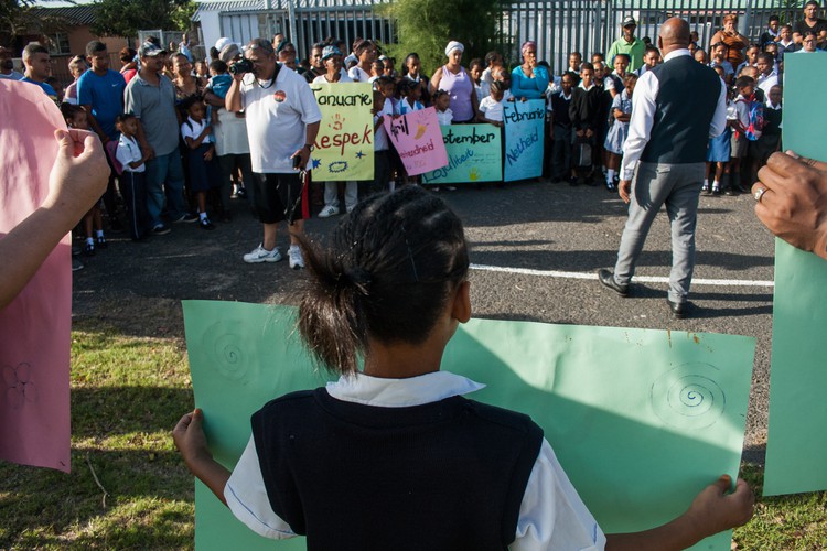 Photo of people with banners