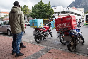 Photo of a man on a motorbike