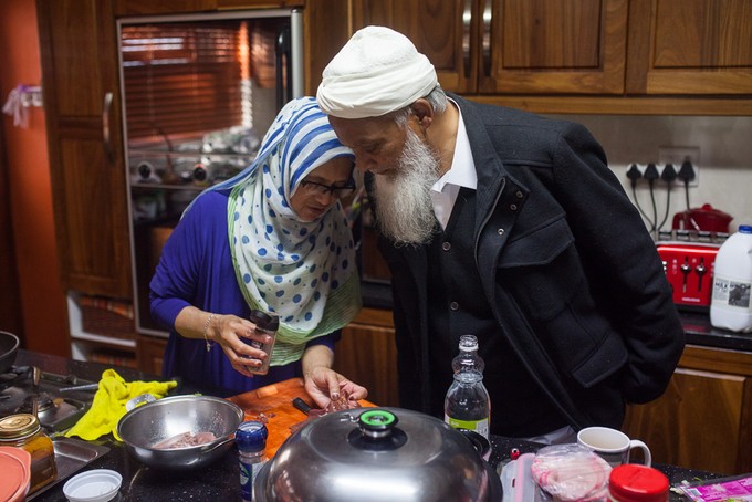 Photo of a man and his wife at table