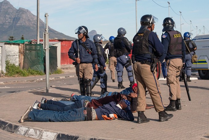 Photo of police overpowering man