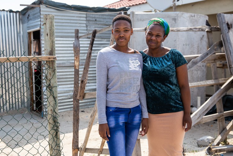 Photo of two women standing together