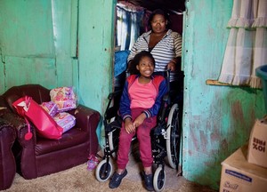 Photo of a teenage girl in a wheelchair