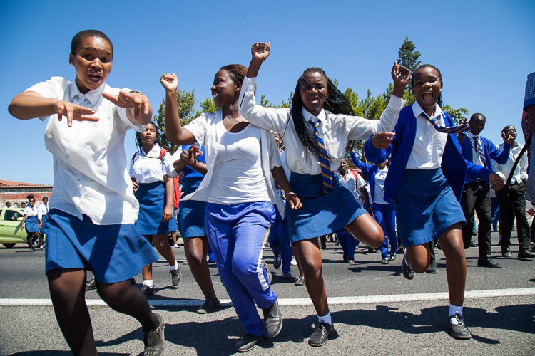 Photo of school students marching