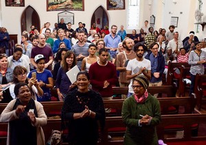 Photo of people in a hall