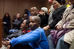 Photo of people in court