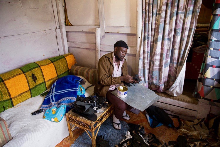 Photo of a seated man working