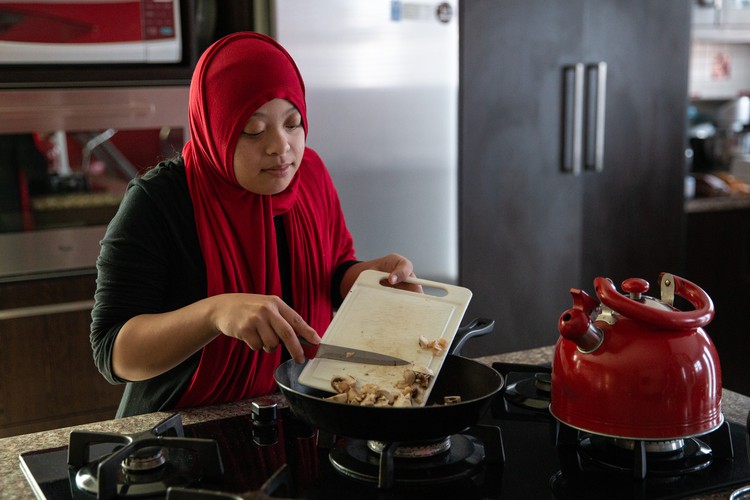 Photo of a woman making breakfast