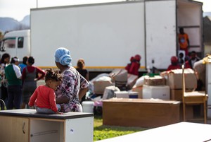 Photo of mother and child at eviction