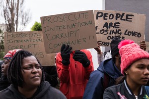 About 50 #UniteBehind members protest outside the German Consulate General in Cape Town.