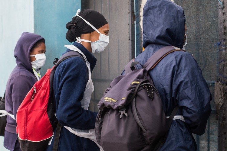 Photo of people wearing masks