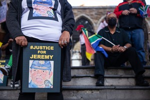 Supporters of axed top cop Jeremy Vearey march to Parliament