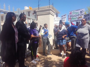 Photo of marchers at magistrates court