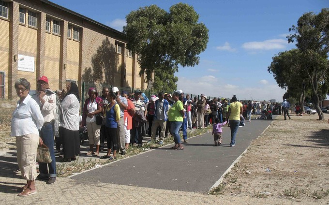 Photo of people in a queue