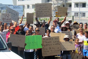 photo of family members protesting