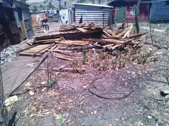 Photo of demolished shacks