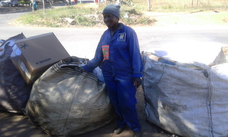 Photo of woman with big bags